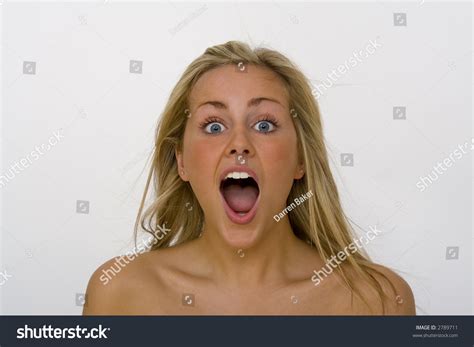 A Beautiful Blond Haired Blue Eyed Woman In Open Mouth Shock Stock
