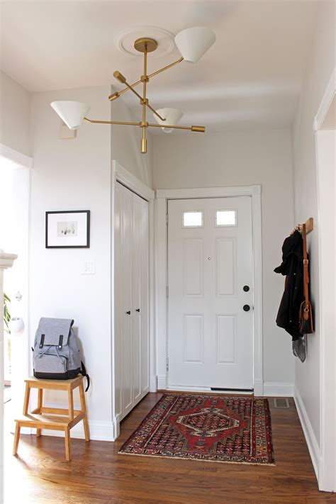 Bungalow Entryway With West Elm Chandelier Persian Rug From Esalerugs
