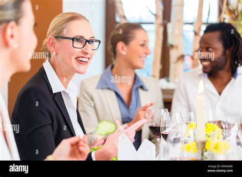 Business Lunch In Restaurant With Food And Wine Stock Photo Alamy