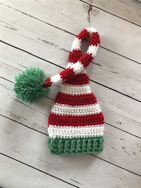 Spread Christmas Cheer With A Long Tail Santa Hat
