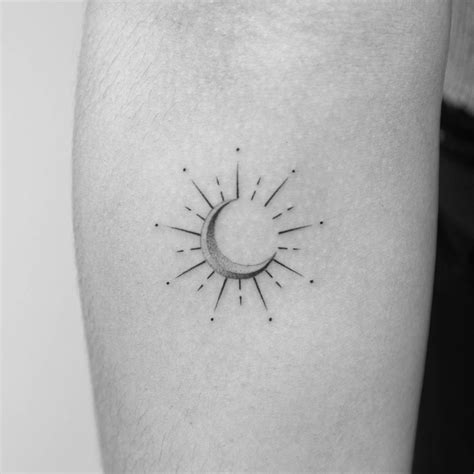 Minimalistic Style Eclipse Tattoo Located On The Inner
