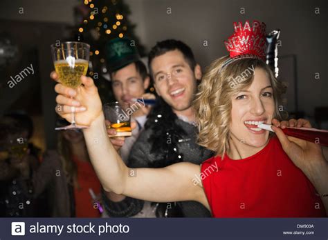 Portrait Of Friends Enjoying New Years Eve Party Stock Photo Alamy