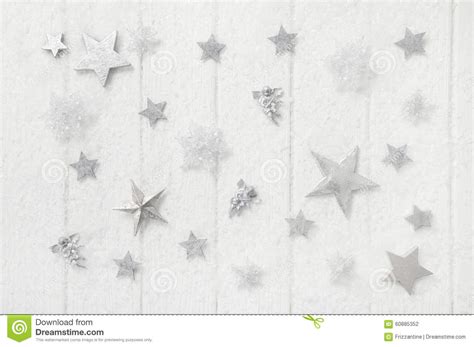 White Snowy Christmas Background With Stars And Snowflakes On Wo Stock