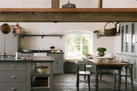 An accordion sconce provides task lighting and an unusual focal point. These 10 English Country Kitchens Will Completely Charm You