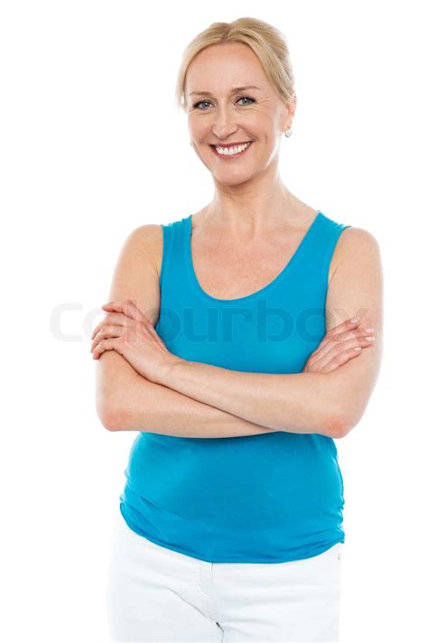 Beautiful Woman Standing With Arms Crossed Stock Image Colourbox