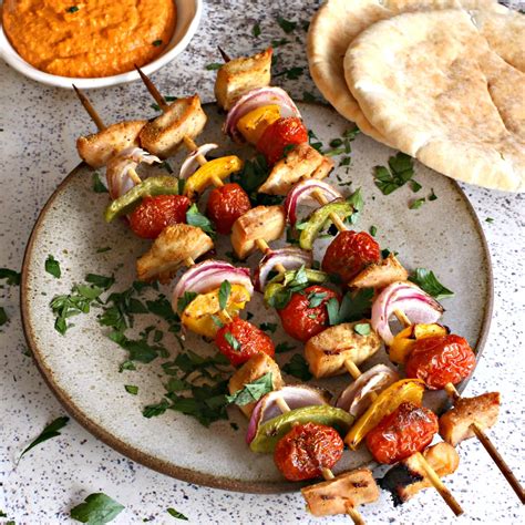 As they grill, the skewers are gilded. Hungry Couple: Grilled Chicken Skewers with Roasted Red ...