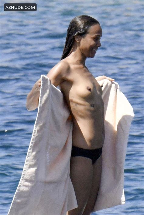 Zoe Saldana Sexy Shows Her Nude Tits In Sardinia AZNude