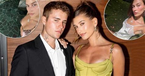 hailey bieber turns up the heat as she slips into a seducing sheer lace dress and an itsy bitsy