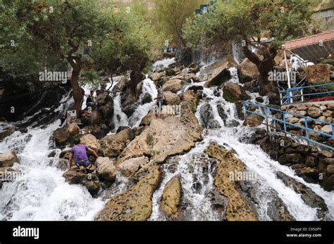 Kurdish Tourists Visiting The Bekhal Waterfall In Zagros Mountains Of