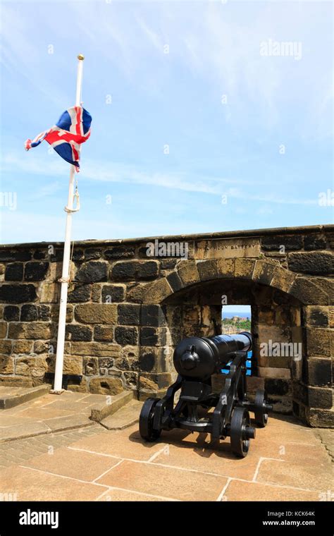 Canon And Union Jack Flag On Half Moon Battery Edinburgh Castle