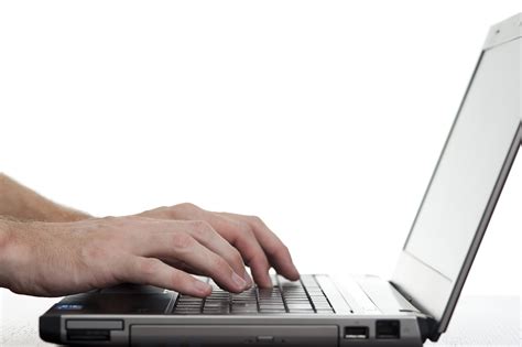 Free Stock Photo 4061 Laptop Computer Typing Freeimageslive