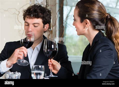 Businesspeople Having Business Lunch In A Fine Dining Restaurant Stock