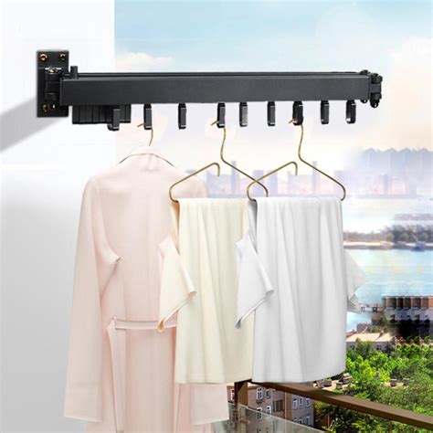 Household essentials collapsible expandable metal clothes drying rack. Folding Clothes Hanger Retractable Foldable Wall Hanging ...