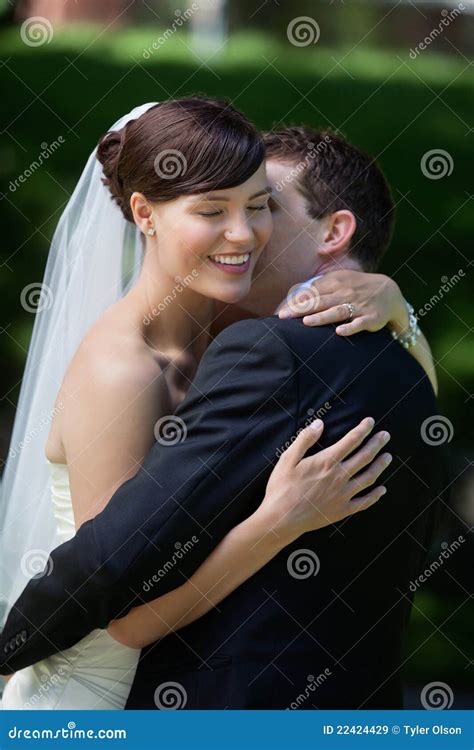 Groom Kisses His Bride Stock Image Image Of Bouquet 22424429
