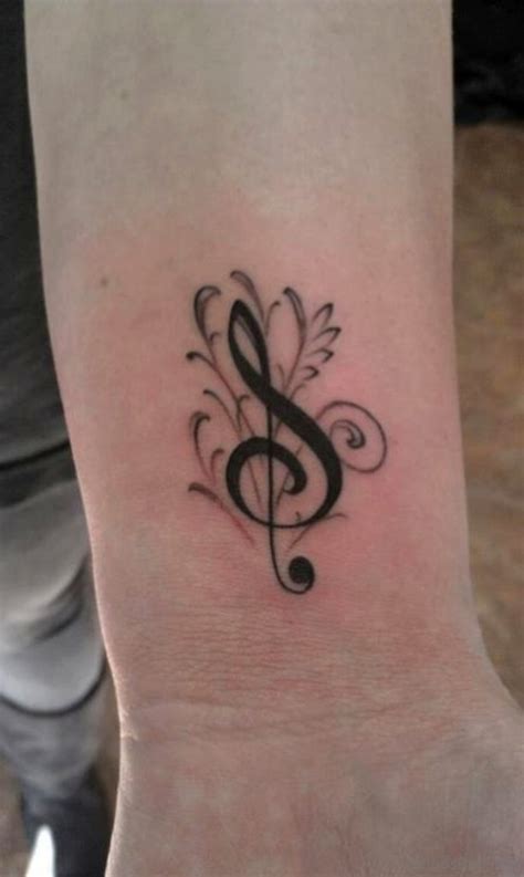 Cool music heart tattoo on wrist. 70 Classic Wrist Tattoos
