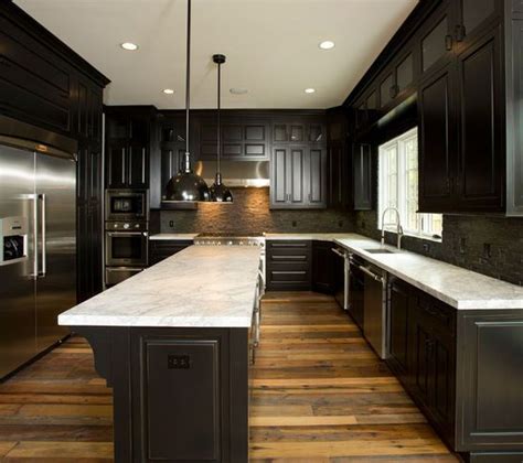 Maybe you would like to learn more about one of these? reclaimed wood floors w/ dark cabinets | Our First Place ...