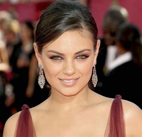 Has 2 different color eyes (one is green, the other is blue). manggo news: Mila Kunis Eyes