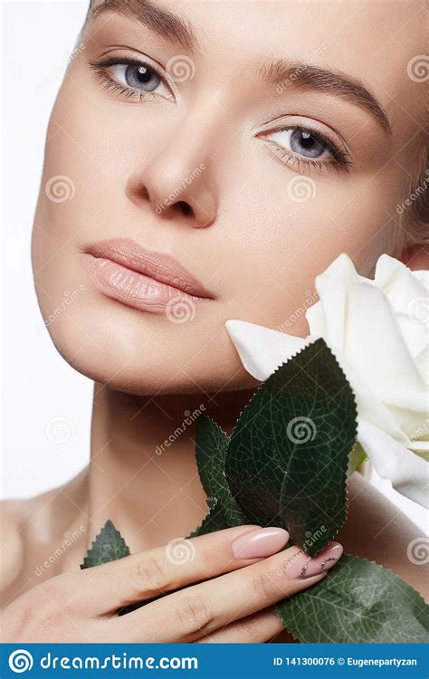 Beautiful Nude Make Up Woman With Flower Stock Photo