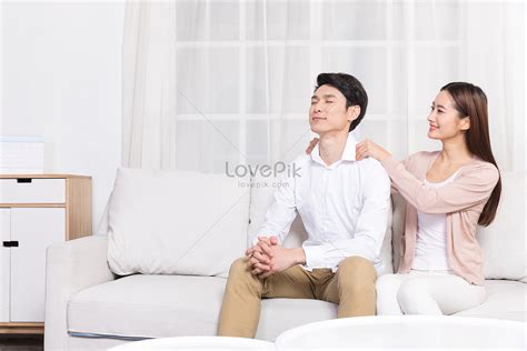 the wife massaged her husband in the living room picture and hd photos free download on lovepik