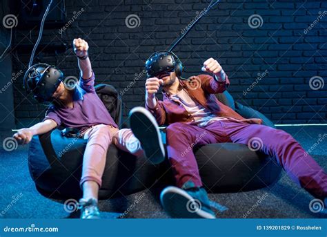 Man And Woman Playing Virtual Reality Together In The Club Stock Image Image Of Game Concept