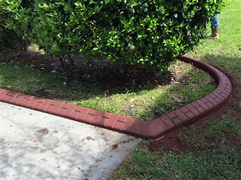 A diy tutorial on how to install concrete landscape edging to improve your home's curb appeal. Landscaping Curbing & Concrete Borders Summerville, SC | Landscape Company & Flower Bed