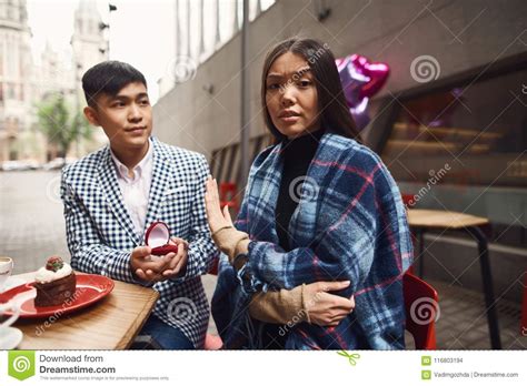It would be pointless to expend all your effort and time on trying to answer just how to get a man to marry you, if the guy you have in mind isn't serious in spending the rest of his life with you. The Girl Refuses The Boy In The Marriage Proposal. Stock Photo - Image of excited, enjoyment ...