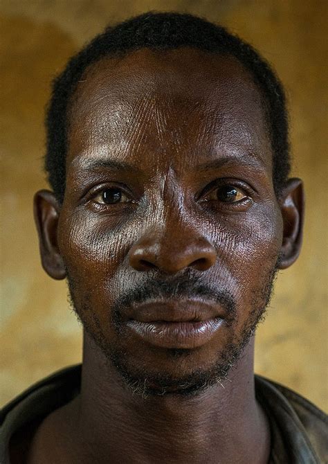 African Male Wide Nose Eyes Spaced Far Apart Large Forehead Face