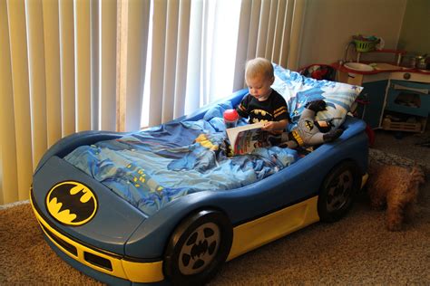 Batman toddler bed sets, new bed did you get a big kid bed weve got all the platform and always ready to musthave baby gear thats durable tough and signature. batmobile bed reading | Batman toddler bed, Diy toddler ...