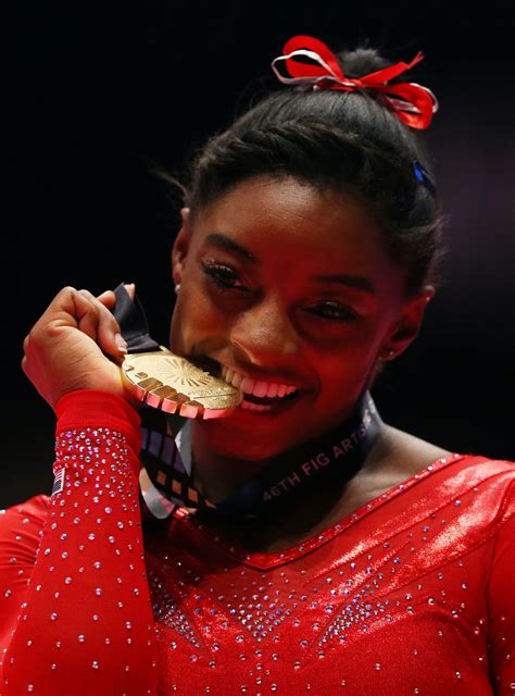 Why Do Olympians Bite Their Medals It Has More To Do With Science Than