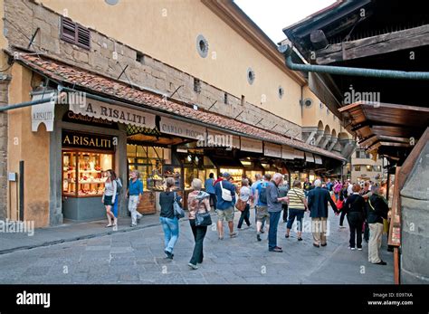 People Tourists And Jewellers Shops On Il Ponte Vecchio Old Bridge