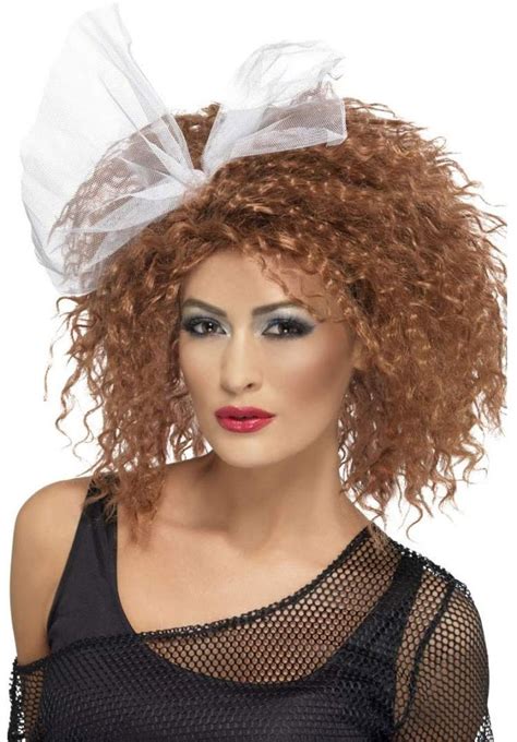 Quelles sont les coiffures à adopter ? Coiffure des années 80 à faire soi-même - 50 idées pour un ...