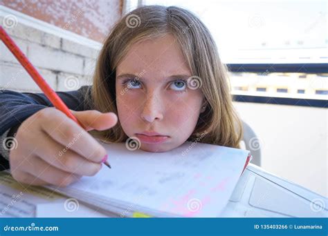 Bored Student Girl Doing Her Homework Stock Photo Image Of Gesture