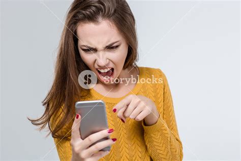 Angry Woman Screaming On The Phone Royalty Free Stock Image Storyblocks