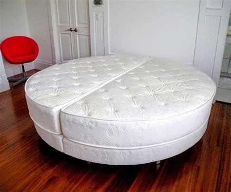 Silky red circle bed with rounded headrest. Custom Round Mattress Set www.comfortcustombedding.com ...