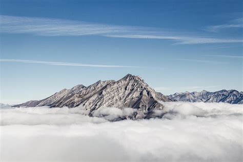 Mountain Peak Above The Clouds Photograph By Adam Foster