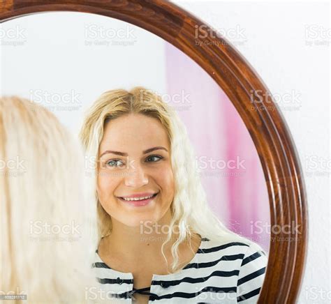 Awake Girl Looking In Mirror On Wall Stock Photo Download Image Now