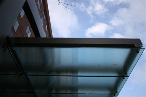 Glass Canopies And Awnings For Walkways Patios And Outdoor Spaces
