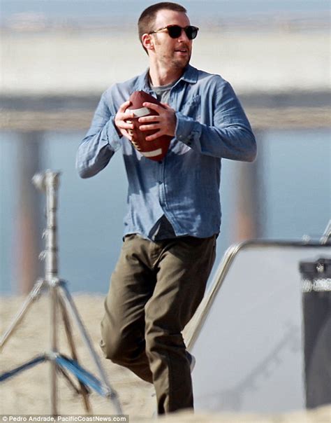 Chris Evans Throws Football Around On Visit To The Beach Daily Mail