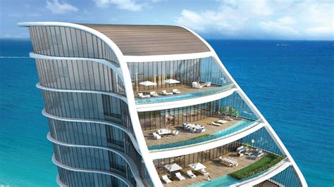 An Architectural Rendering Of A Futuristic Hotel On The Beach With