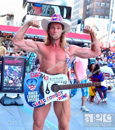 The Naked Cowboy Playing His Guitar In Times Square New York City Featuring Naked Cowboy Where