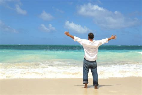 Single Male Standing On Beach Facing Ocean Stock Photo Image Of