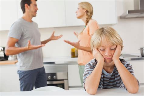 Parents Arguing While Their Child Being Disappointed Stock Photo