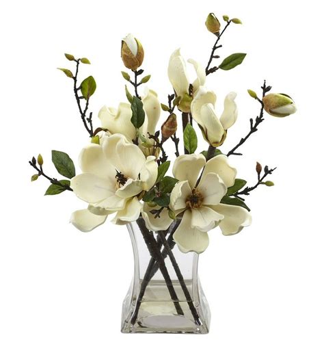 We focus on selecting the highest quality of artificial flowers, ensuring that they look as realistic as possible. White Magnolia Silk Flower Arrangement with Vase ...