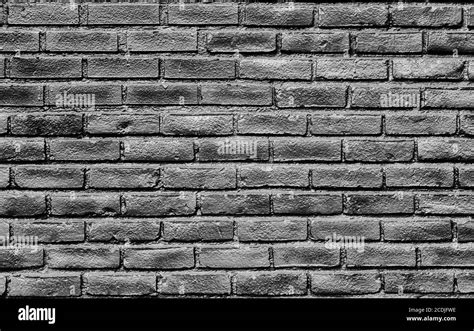 High Contrast Glossy Brick Wall Stock Photo Alamy