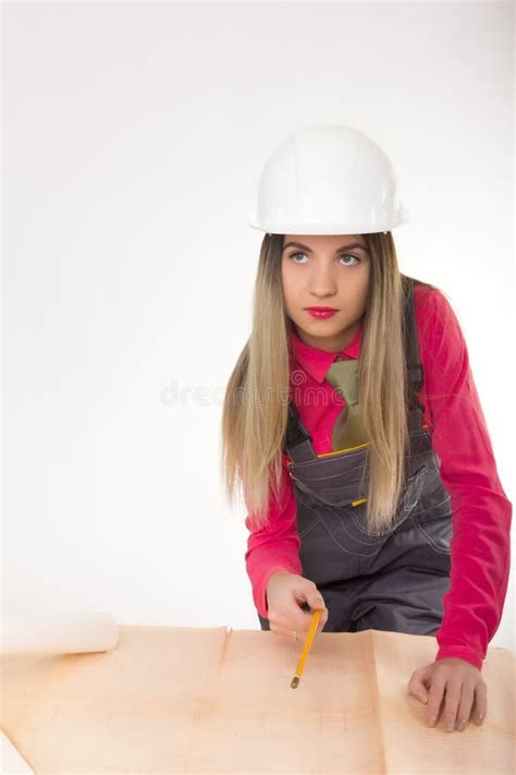 Female Civil Engineer Standing Next To The Table She Bent Over Blueprints Young Female