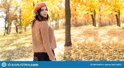 Outdoor Portrait Of Young Beautiful Woman In Autumn Park Warm Autumn