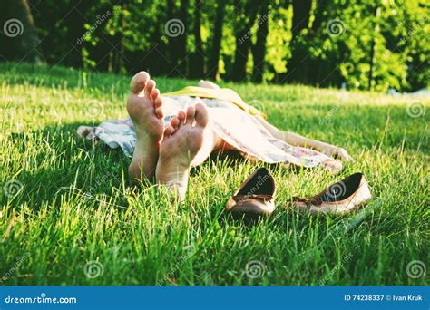 Girl Lying Barefoot Without Shoes Stock Image Image Of Grass Feet 74238337