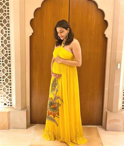 Kajal Aggarwal Slays Maternity Fashion In Halter Neck Yellow Chiffon Patterned Maxi Dress Worth