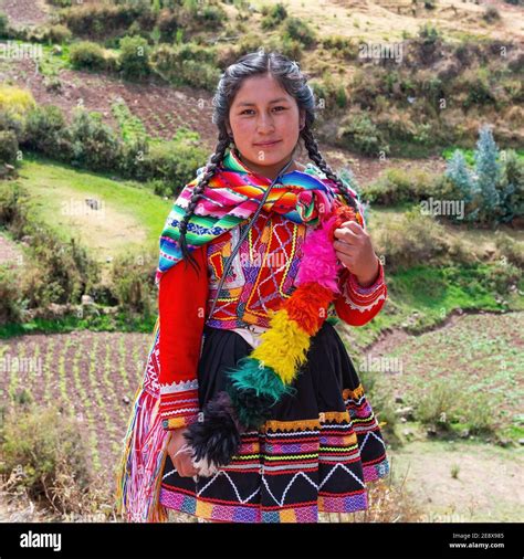 Indigenous Peruvian Quechua Woman With Traditional Clothing In The