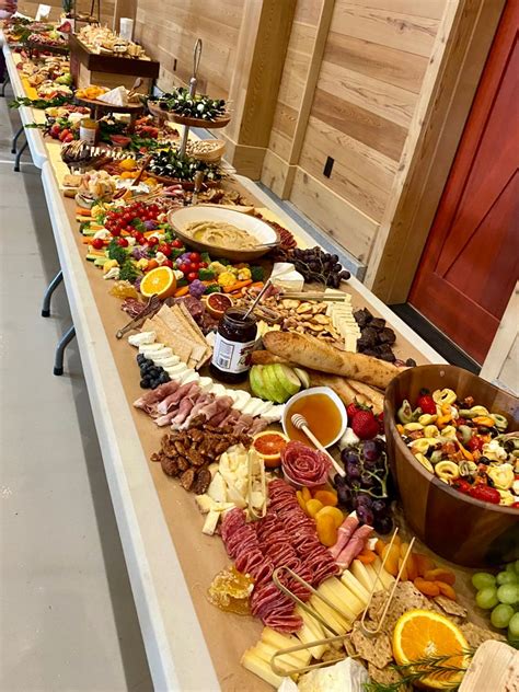 20 feet of charcuterie grazing, wedding grazing. By Gianna Tenyenhuis